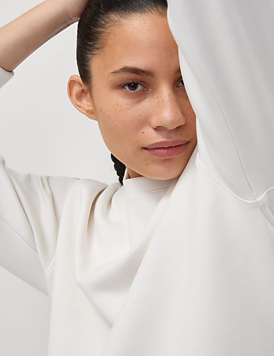 Oversized yogasweater met plooi achter