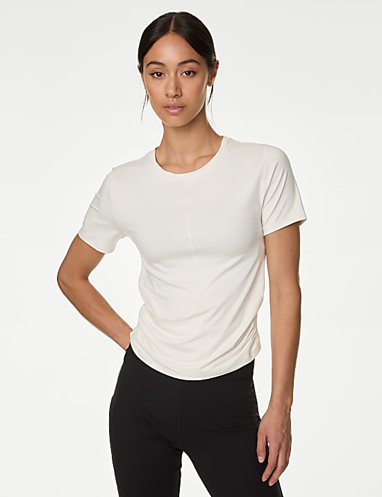 Yoga-T-shirt met lage ronde hals en wikkelstijl voorop