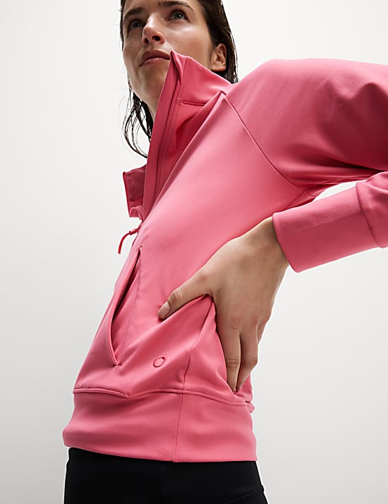 Yogatop met opstaande kraag en halflange rits