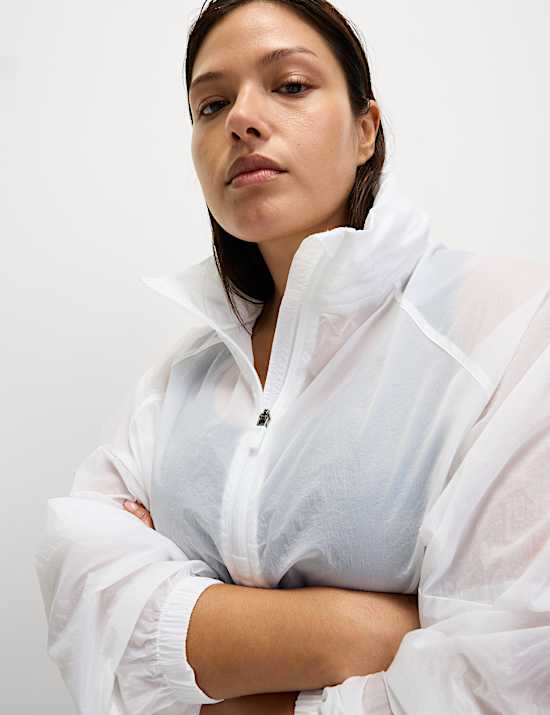 Αθλητικό τζάκετ με κουκούλα και μισό φερμουάρ