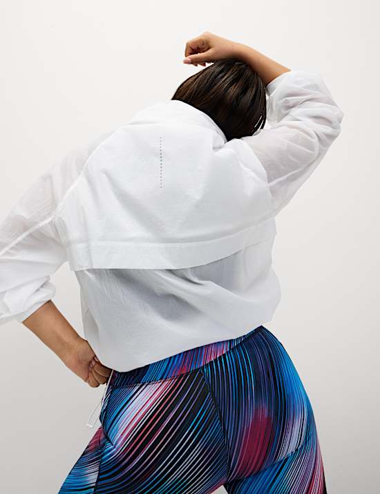 Αθλητικό τζάκετ με κουκούλα και μισό φερμουάρ