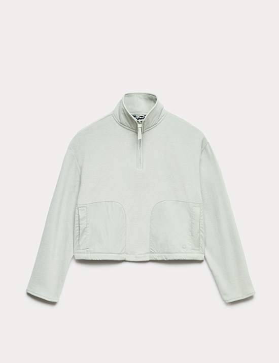 Forro polar corto informal con media cremallera y cuello chimenea