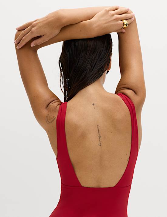 Buikcorrigerend badpak met diepe plunge