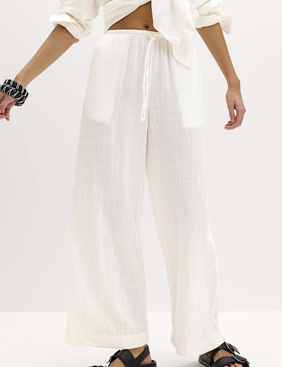 Pl&aacute;žov&eacute; kalhoty se stahovac&iacute; &scaron;ňůrkou, z čist&eacute; bavlny