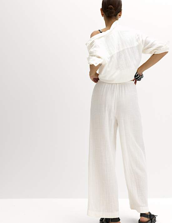 Pl&aacute;žov&eacute; kalhoty se stahovac&iacute; &scaron;ňůrkou, z čist&eacute; bavlny