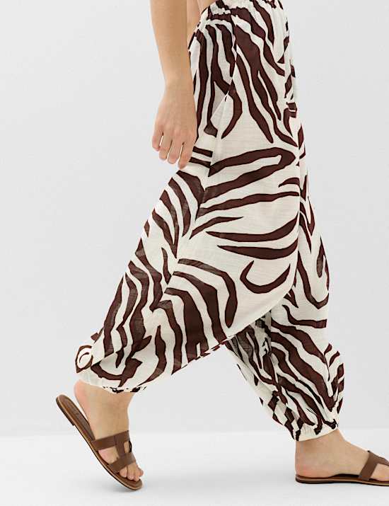 Zuiver katoenen parachutebroek met hoge taille en dierenprint