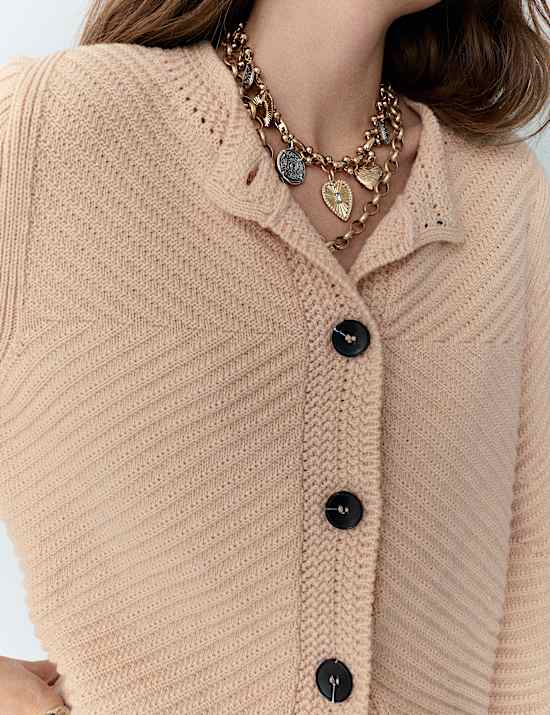 Cardigan côtelé à manches bouffantes