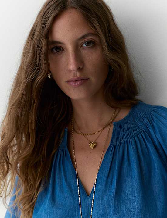 Bluse aus reiner Baumwolldenim mit V-Ausschnitt und Biesen