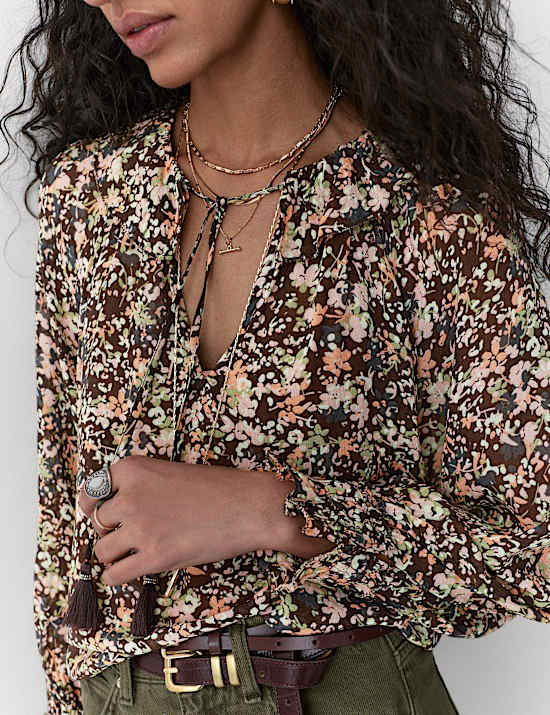 Blouse met ruches en bloemmotief