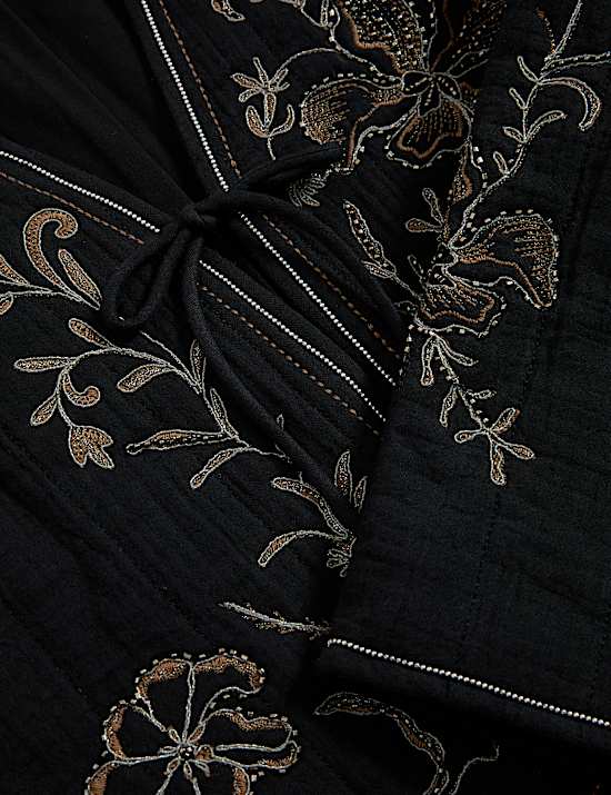 Veste 100 % coton embellie d’un nœud sur le devant