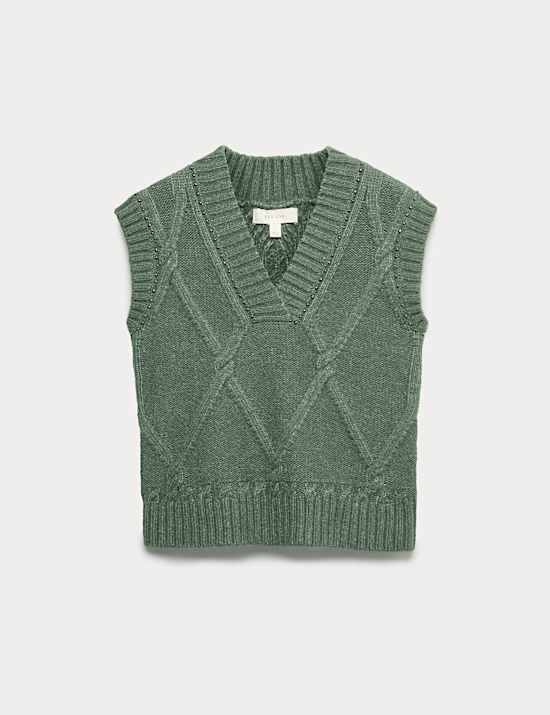 Tabard en maille torsadée à col en V avec décoration