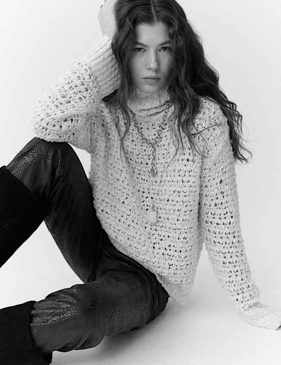 Pull en bouclé à col roulé avec laine