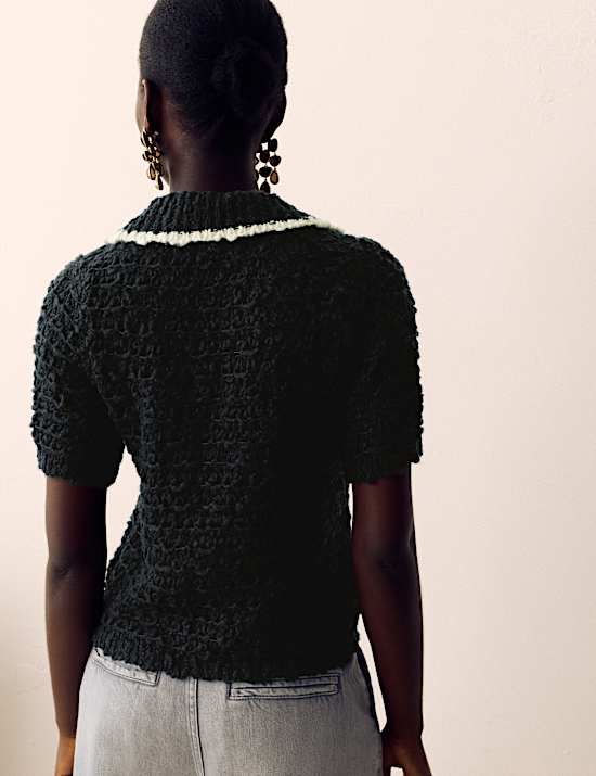 Polo de punto de manga corta con cuello texturizado con lana