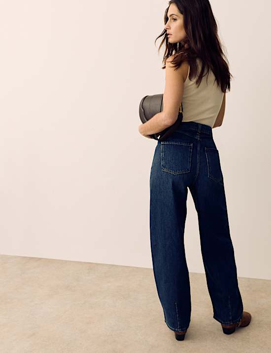 Jean coupe fusel&eacute;e taille haute avec d&eacute;coupe avant