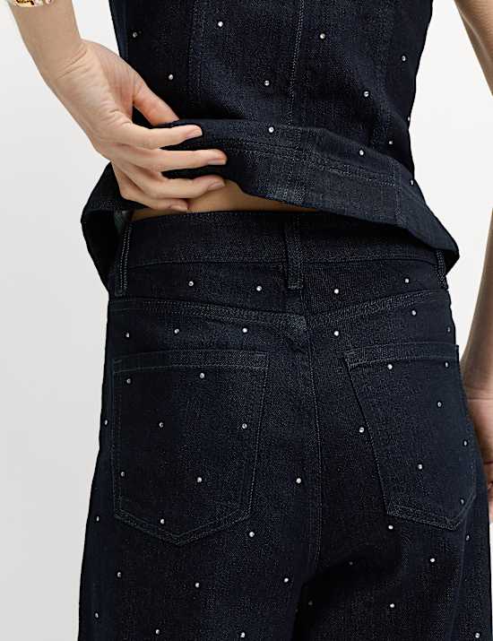 Jean en coton denim coupe carotte avec décoration