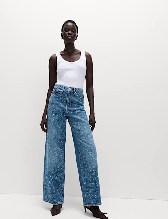 Versierde jeans met hoge taille en wijde pijpen