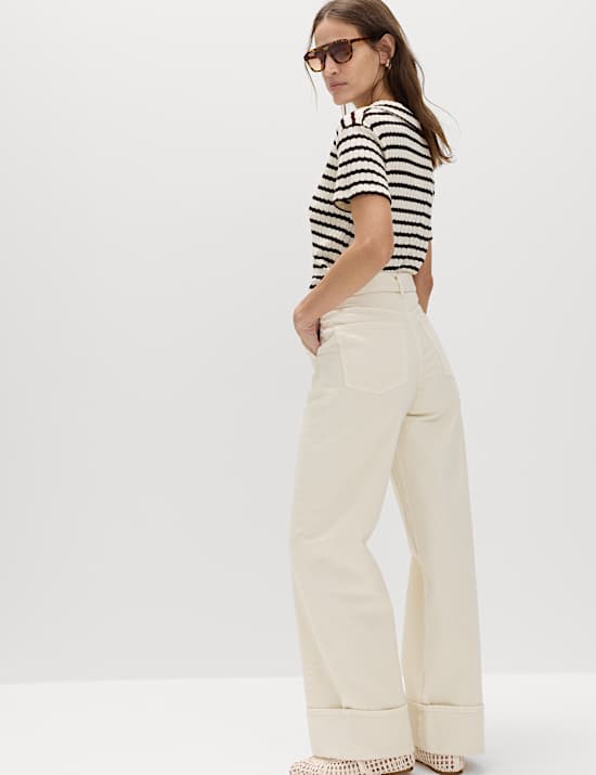 Jeans 100 % algod&oacute;n de pata ancha con dobladillo vuelto y cintur&oacute;n