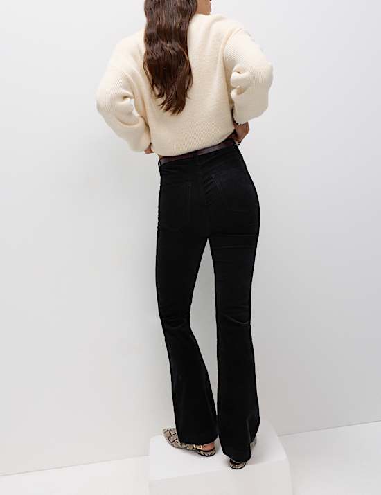 Úzké rozšířené kalhoty s bavlnou a záhyby vpředu