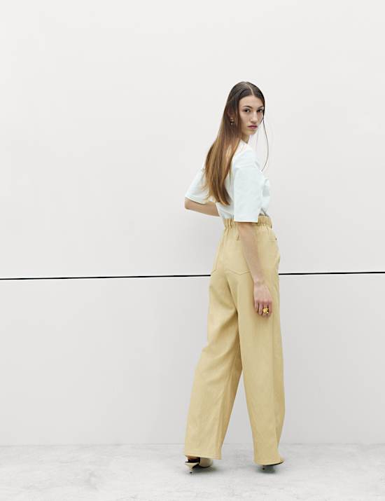 Pantalon coupe large sac en papier en similicuir