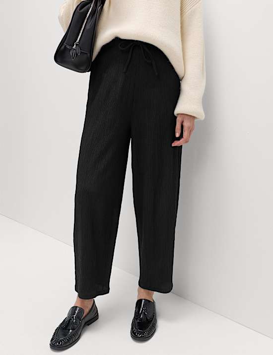Pantalon textur&eacute; coupe carotte &agrave; taille &eacute;lastique