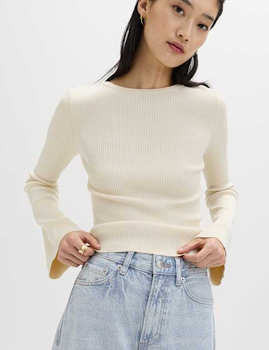 Jeans con vuelta de pata ancha de cintura alta