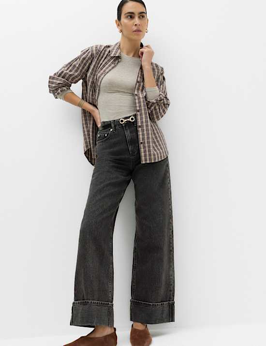 Jeans con vuelta de pata ancha de cintura alta