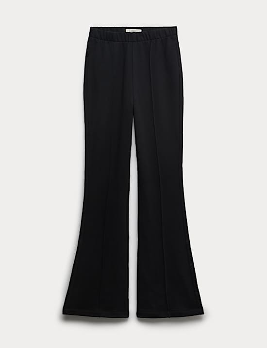 Pantalones deportivos acampanados 100 % algod&oacute;n con detalle de costuras