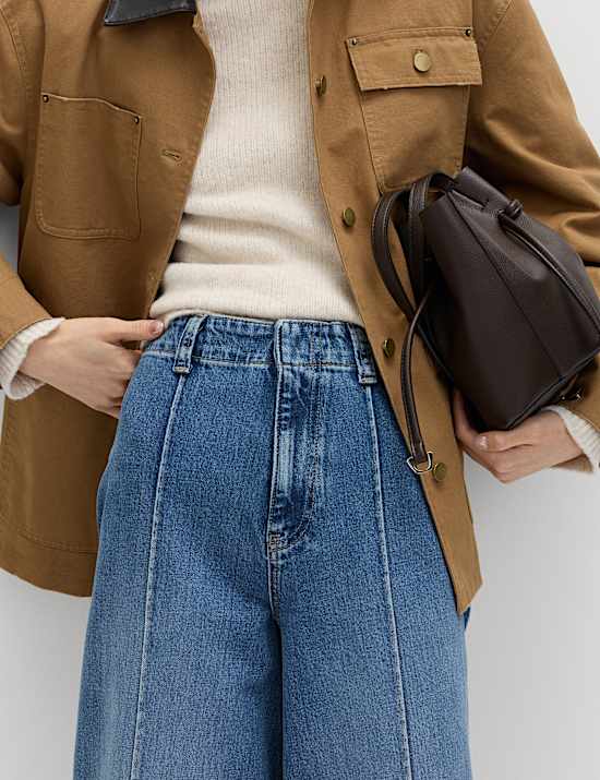 Dżinsy z szeroką nogawką do kostki i szczypanką