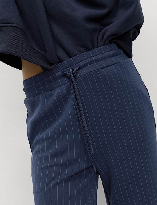 Pantalones deportivos de pernera ancha de rayas en mezcla de modal