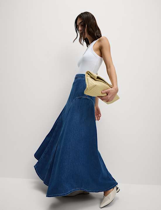 Falda maxi denim asim&eacute;trica de cintura alta
