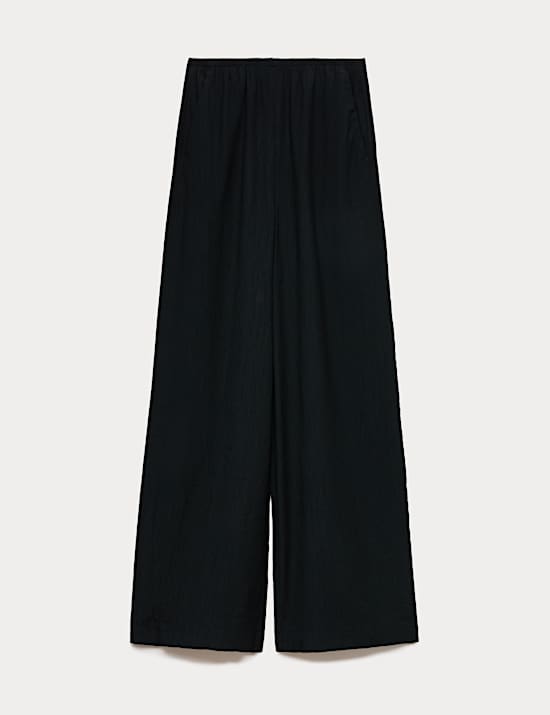 Pantalones de pata ancha con cintura con el&aacute;stico arrugados