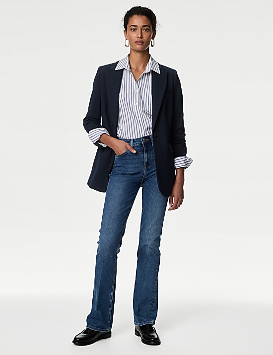 Ruimvallende blazer met enkele rij knopen