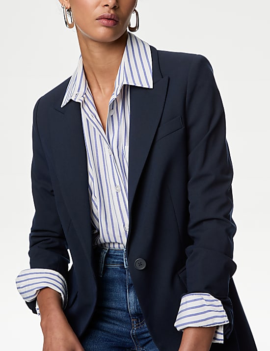 Ruimvallende blazer met enkele rij knopen