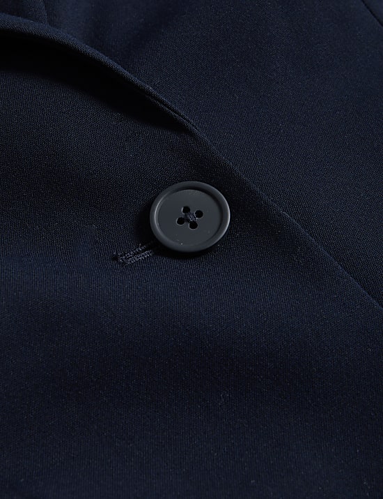 Ruimvallende blazer met enkele rij knopen