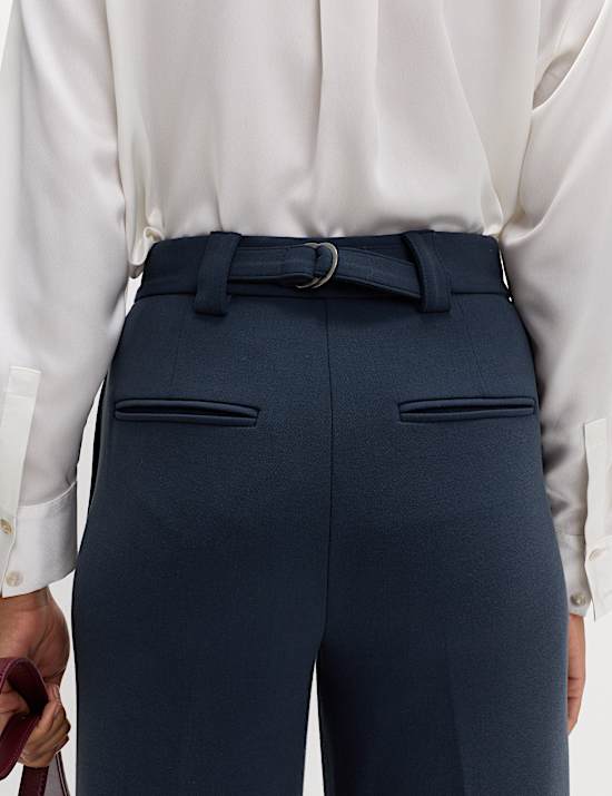 Pantalon van crêpestof met wijde pijpen en knooplus