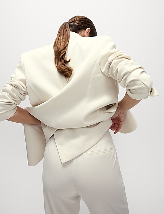 Tkan&eacute; kalhoty s rovn&yacute;mi nohavicemi, se strečem