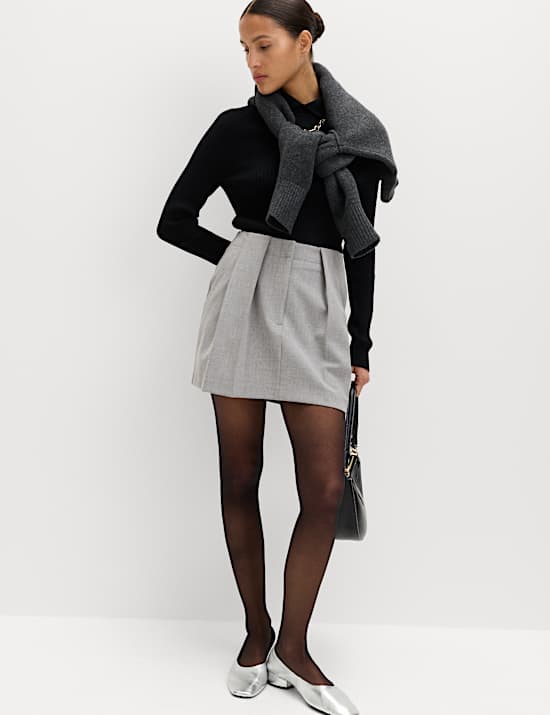 Minifalda plisada jaspeada