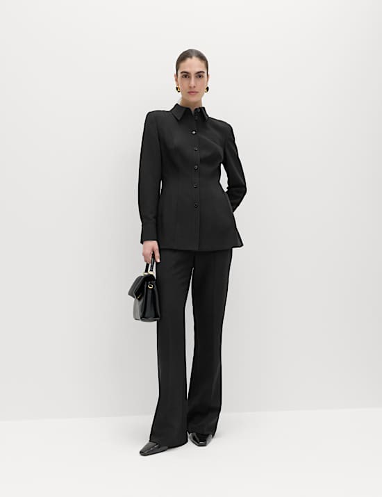 Wąskie spodnie rozszerzane z suwakiem z boku