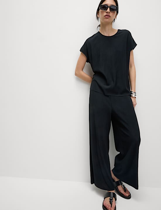 Plissierte 3/4-Hose mit weitem Bein