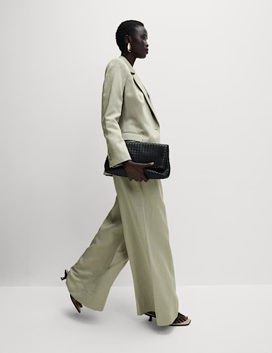 Single-breasted, getailleerde blazer in lang model van linnenmix