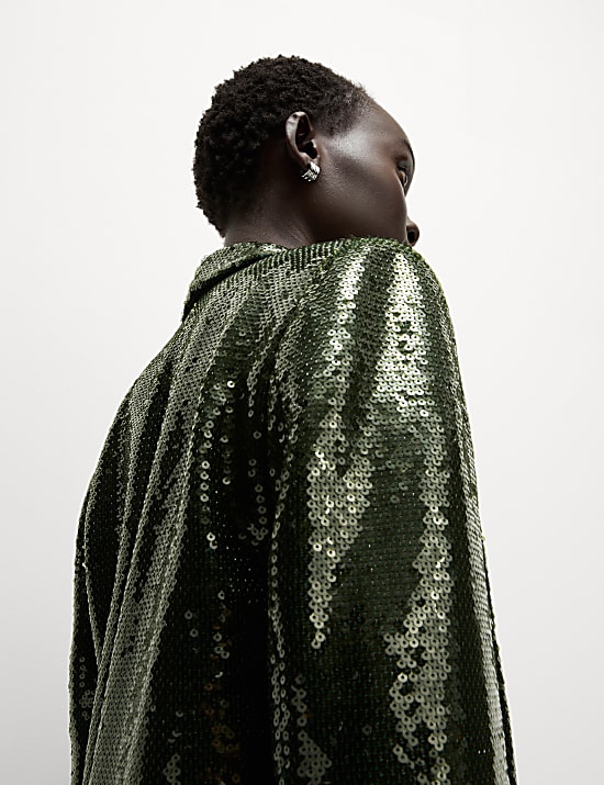 Ruimvallende blazer met versiering en enkele rij knopen