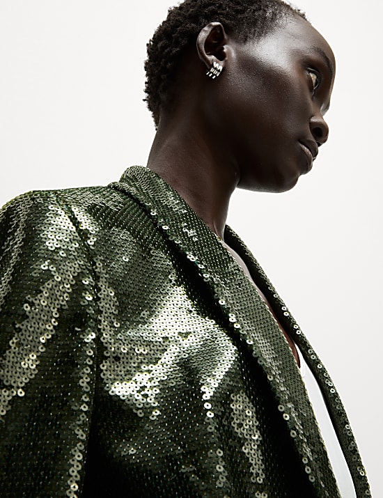 Ruimvallende blazer met versiering en enkele rij knopen