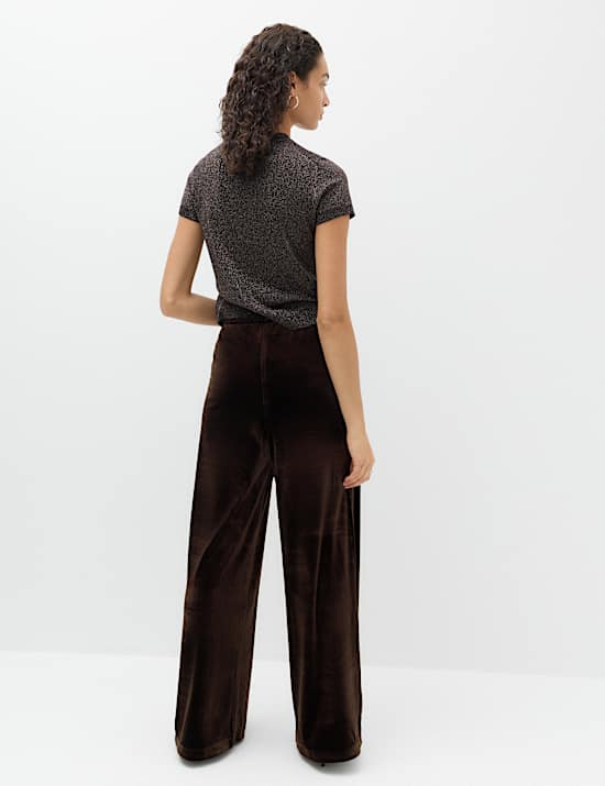 Pantalon en velours coupe large &agrave; taille &eacute;lastiqu&eacute;e