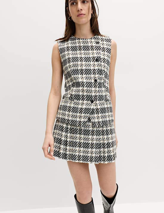 Minijupe pliss&eacute;e &agrave; carreaux