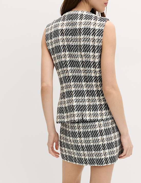 Minijupe pliss&eacute;e &agrave; carreaux