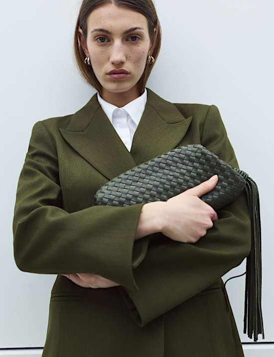 Długa taliowana marynarka asymetryczna