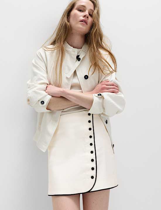 Minirok van linnenmix met contrasterende bies