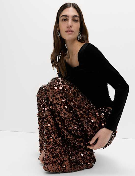 Broek met lovertjes en wijde pijpen