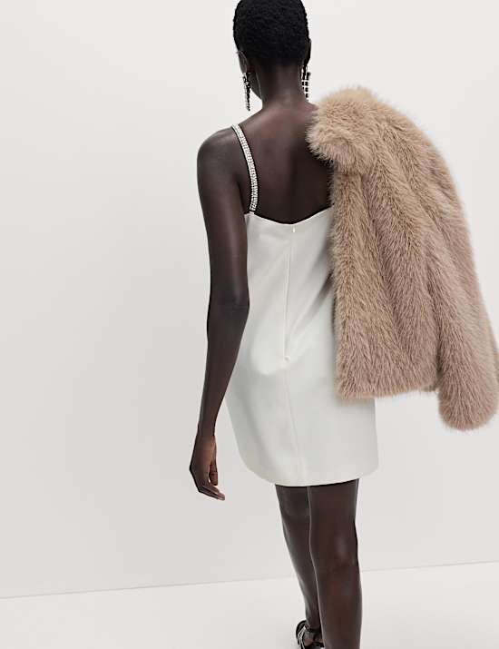 Mini-jurk versierd met strikdetail