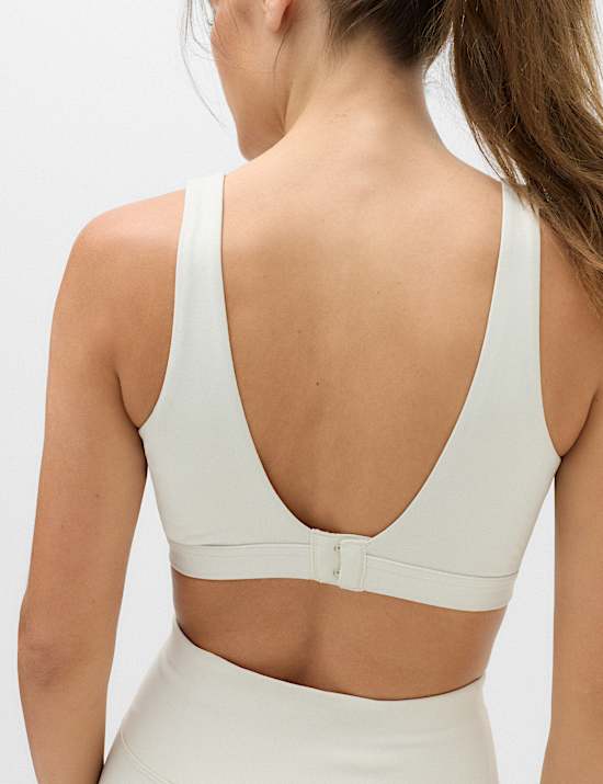 Soutien-gorge de sport crois&eacute; impact faible (bonnets A &agrave; E)